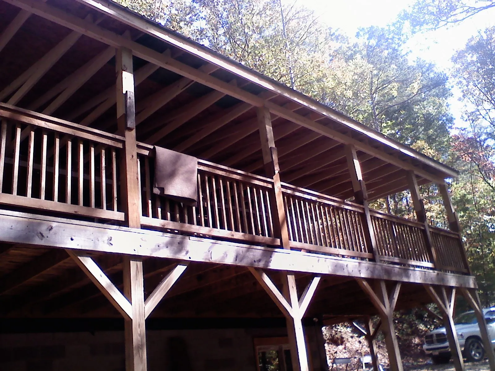 Timber framing under a new elevated porch and deck — Roof Leak Repair in Deltaville by Roofing Brothers